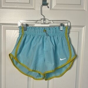 Nike athletic shorts. Baby blue with yellow. Cute waist